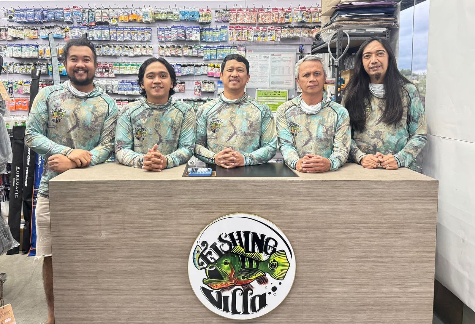 The Fishing Villa team behind the counter of the Quezon City shop